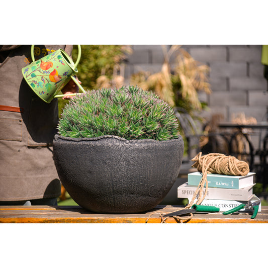 a sturdy and weather-resistant flower pot crafted from Jun porcelain clay with polymer resin infusion. Suitable for indoor and outdoor use, perfect for displaying flowers or green plants. Ideal for gardening enthusiasts, available for purchase now.