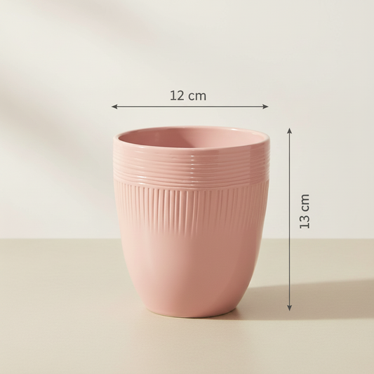 Pink ceramic pot on a tabletop