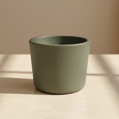 HD olive-green ceramic planter on tabletop