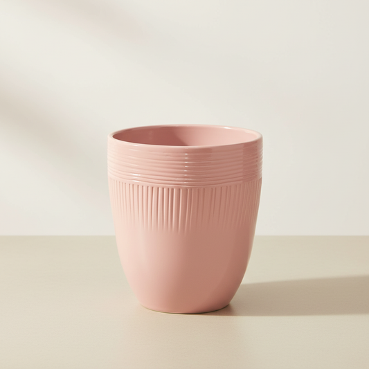 Pink ceramic pot on a tabletop